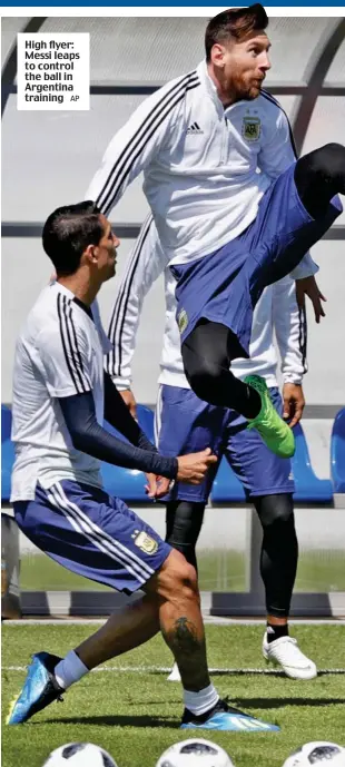  ?? AP ?? High flyer: Messi leaps to control the ball in Argentina training