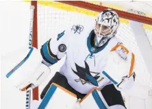  ?? Darryl Dyck / Associated Press ?? Sharks goaltender Martin Jones had 25 saves in San Jose’s sixth straight victory. He improved to 27-10 this season.