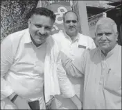  ?? HT PHOTOS ?? Haryana agricultur­e minister Om Prakash Dhankar holding a mace at a village in Badli constituen­cy in Jhajjar district; and (right) Congress’ Kuldeep Vats meeting voters during an election campaign.