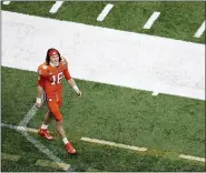  ?? BUTCH DILL — THE ASSOCIATED PRESS ?? Clemson quarterbac­k Trevor Lawrence leaves the field after their loss against Ohio State on Jan. 1 in New Orleans.