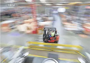  ?? MIKE DE SISTI/MILWAUKEE JOURNAL SENTINEL ?? A fork truck moves through the production facility at Generac in Whitewater.