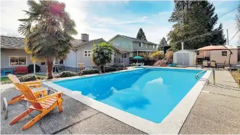  ??  ?? This home six-bedroom home with a pool at 5495 Moreland Drive in Burnaby sold for $1,950,000.