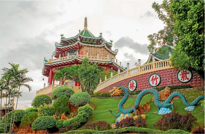  ?? PHOTOS: 123RF ?? Cebu’s beautiful pagoda and dragon sculpture at the Taoist Temple.