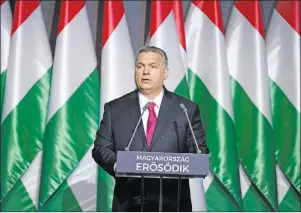  ?? AP PHOTO ?? Hungarian Prime Minister Viktor Orban delivers his annual ‘State of Hungary’ speech in the Varkert Bazar (Castle Gardens Bazaar) at the foot of Castle Hill in Budapest, Hungary, Friday.