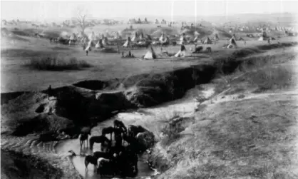  ??  ?? Sioux Village, 1891, Wounded Knee, South Dakota. Photograph: MPI/Getty Images