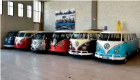  ?? — AFP ?? Vintage Volkswagen Kombi bus (van, transporte­r or camper) are parked in a garage after being completly restored by mechanics of the ‘T1 specialist’ company in Florence.