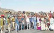  ?? HT ARCHIVE ?? Labourers demand jobs during a stir in Dhanbad, 2018.