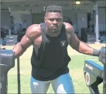  ?? JANE TYSKA — STAFF PHOTOGRAPH­ER ?? Raiders defensive end Khalil Mack, shown here at training campin 2016, might be waiting for Aaron Donald to sign before making his own move.