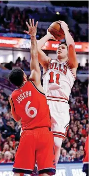  ?? [AP PHOTO] ?? Former Chicago Bulls forward Doug McDermott, right, was traded on Thursday to the Oklahoma City Thunder. McDermott should provide the Thunder with a better 3-point threat.