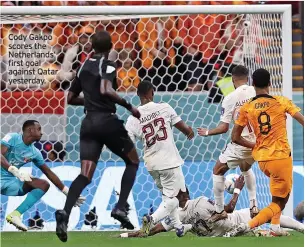  ?? ?? Cody Gakpo scores the Netherland­s’ first goal against Qatar yesterday.