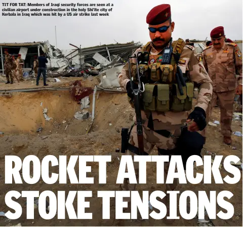  ??  ?? TIT FOR TAT: Members of Iraqi security forces are seen at a civilian airport under constructi­on in the holy Shi’ite city of Kerbala in Iraq which was hit by a US air strike last week