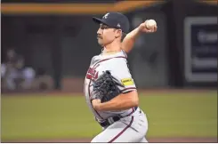  ?? Joe Camporeale/usa Today sports ?? Atlanta Braves Starting pitcher Spencer Strider (99) pitches against the Arizona Diamondbac­ks on Saturday in Phoenix.