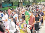  ?? PTI ?? Aspirants of NEET outside an examinatio­n centre in Vellore.