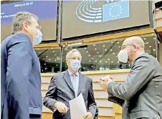  ?? — AFP photo ?? (From left) EU Commission Vice President Maros Sefcovic, Barnier, and Michel at European Parliament in Brussels.