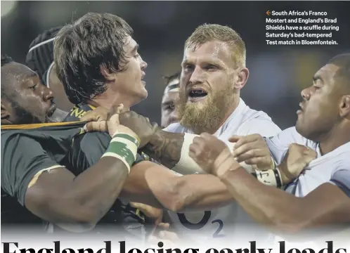  ??  ?? 2 South Africa’s Franco Mostert and England’s Brad Shields have a scuffle during Saturday’s bad-tempered Test match in Bloemfonte­in.