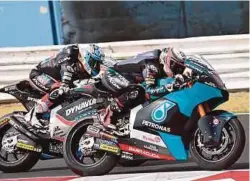  ?? AFP PIC ?? Petronas Sprinta Racing’s Xavi Vierge (right) steers his bike during the Moto2 race of the Emilia Romagna Grand Prix yesterday.