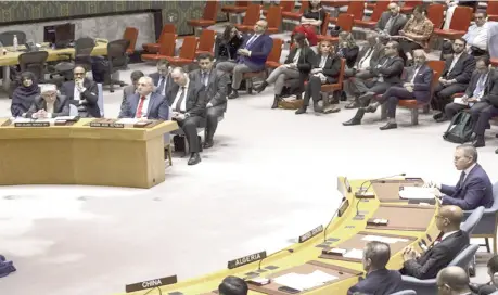  ?? ?? NEW YORK:Iran’s UN Ambassador Amir Saeid Iravani, top left, listens as Israel’s Ambassador Gilad Erdan addresses the United Nations Security Council during an emergency meeting at UN headquarte­rs.