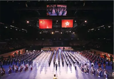  ?? PARKER ZHENG/ CHINA DAILY ?? Military bands from many countries play at the Internatio­nal Military Tattoo show at Hong Kong Coliseum on Thursday. The show, involving 13 military bands, including that from the People’s Liberation Army Hong Kong Garrison, is to mark the 20th...