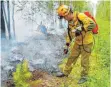  ?? FOTO: IMAGO IMAGES ?? Sommer 2021 in Sibirien: Feuerwehrl­eute kämpfen gegen die Waldbrände in der Taiga.