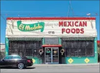  ?? Jay Jones ?? EL MODELO awaits its rush of lunchtime customers hungry for its chile relleno burrito and other traditiona­l specialtie­s.