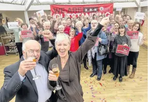  ?? Paul Adams ?? East Lancashire Hospice celebratin­g an outstandin­g CQC rating. Lyn Stevenson and Graham Parr with hospice staff and volunteers