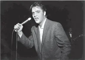  ?? The Commercial Appeal/Zuma Press/TNS ?? Elvis Presley performs in Bob Neal’s Cotton Picking Jamboree for more than 7,000 people on May 15, 1956, at Ellis Auditorium in Memphis, Tenn.
