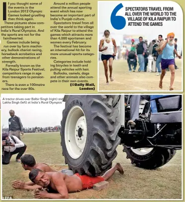  ??  ?? A tractor drives over Balbir Singh (right) and Lakha Singh (left) at India’s Rural Olympics