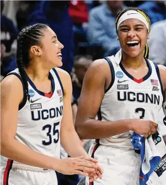  ?? Jessica Hill/Associated Press ?? UConn’s Aaliyah Edwards (3) celebrates with teammate Azzi Fudd (35) in the second half of Saturday’s win over Vermont.