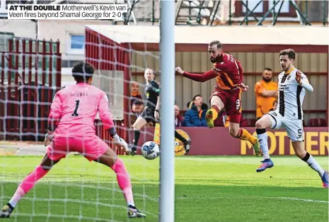  ?? ?? AT THE DOUBLE Motherwell’s Kevin van Veen fires beyond Shamal George for 2-0