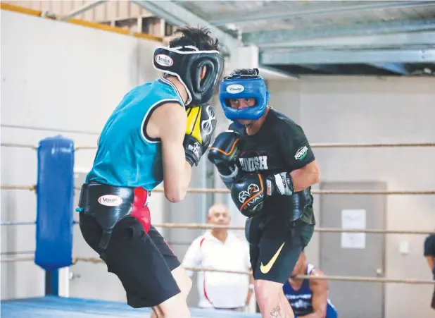  ?? Picture: JUSTIN BRIERTY ?? EAGER OPPONENT: Townsville boxer Josh King spars with local boxer Johnny Addo before his national title bout with Michael Katsidis on March 11.