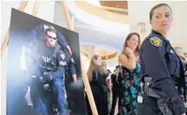  ?? AMY BETH BENNETT/SUN SENTINEL ?? Fort Lauderdale Police Detective Christophe­r Sheehan was eulogized with full honors in a funeral service at the Broward Center for the Performing Arts last August.