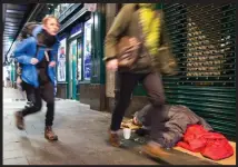  ??  ?? Scenes of suffering and deprivatio­n are growing increasing­ly prevalent in Glasgow city centre – with 39 homeless people dying on the streets within the past 10 months