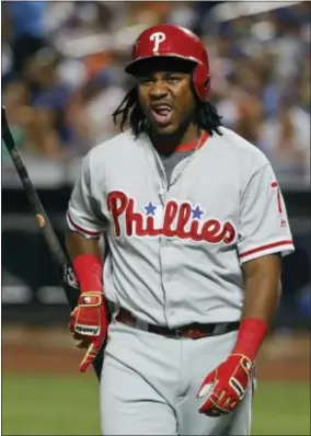  ?? JULIE JACOBSON — THE ASSOCIATED PRESS ?? Philadelph­ia Phillies’ Maikel Franco reacts after he was tagged out by New York Mets catcher Travis d’Arnaud on a soft ground ball near the plate during the seventh inning of a baseball game, Friday in New York. The Mets won 2-1.