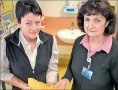  ??  ?? Kyabram District Health Services credential­ed diabetes educators Wendy Progue and Anne Waterman hold onto a model of fat.