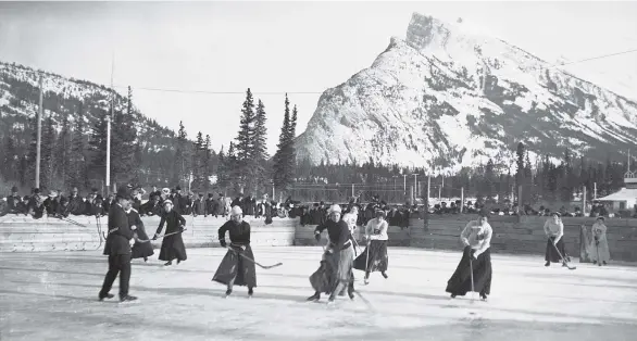  ??  ?? A century ago, toques and long heavy skirts were required wear in women’s hockey.