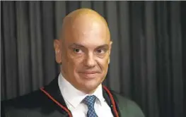  ?? ?? BACKERS of Brazilian Supreme Court Justice De Moraes, pictured in August, view his brash tactics as justified by the extraordin­ary recent circumstan­ces.