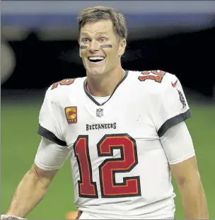  ?? AP FILE ?? Tom Brady has agreed to a contract extension with the Buccaneers that provides the Super Bowl champions with much-needed salary cap relief and will help the seven-time NFL champion reach a goal of playing until he’s at least 45.