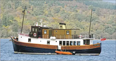  ??  ?? The Glen Tarsan, spotted in Brodick Bay last week is a converted traditiona­l fishing vessel which offers cruises.