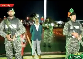  ??  ?? Indian pilot, Wing Commander Abhinandan, stands under armed escort near Pakistan-India border in Wagah, Pakistan in this March 1, 2019 image from a video footage. Reuters/PTV via Reuters TV