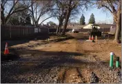  ?? ?? Installed lines for gas and sewage are seen Wednesday at the Everhart Village emergency shelter project site in Chico. Twenty cabins with kitchen and bath are planned to be installed.