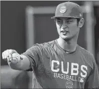  ?? AP PHOTO ?? Chicago Cubs starting pitcher Yu Darvish takes a break from warmup pitches at the team’s spring training facility Tuesday in Mesa, Ariz.