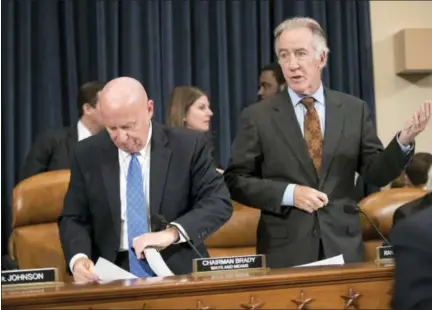  ?? J. SCOTT APPLEWHITE — THE ASSOCIATED PRESS ?? House Ways and Means Committee Chairman Kevin Brady, R-Texas, left, calls for a short recess to consider his manager’s amendment, to the objections of Rep. Richard Neal, D-Mass., right, the ranking member, as the GOP tax bill debate enters a final day...