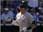  ?? CHARLIE RIEDEL — THE ASSOCIATED PRESS ?? The Yankees' Aaron Judge crosses the plate after hitting his second home run of the game in the ninth inning Sunday against the Royals.