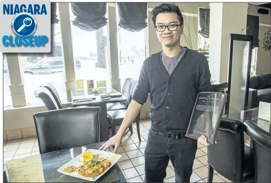  ?? BOB TYMCZYSZYN/POSTMEDIA NETWORK ?? Singha Chanthanat­ham is owne of the Green Lotus restaurant in St. Catharines, which has seen an increase in visitors during the under-18 women’s hockey championsh­ip.