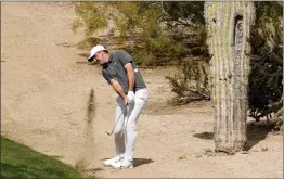  ?? DARRYL WEBB — THE ASSOCIATED PRESS ?? Scottie Scheffler hits from just off the fairway on the second hole during the third round of the Phoenix Open, Saturday, in Scottsdale, Ariz.