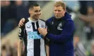 ?? Smith/Action Images/Reuters ?? The Newcastle manager, Eddie Howe (right), praises match-winner Miguel Almirón after the game. Photograph: Lee