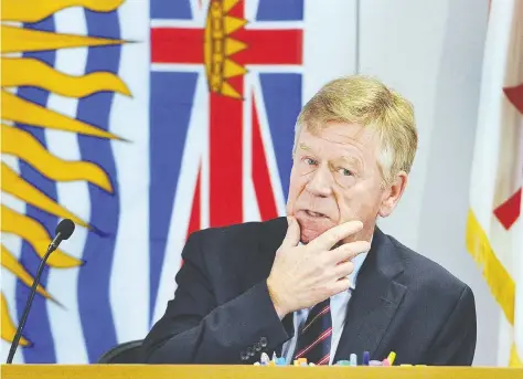 ?? NICK PROCAYLO / POSTMEDIA NEWS ?? Justice Austin F. Cullen makes opening statements at the commission into money laundering in Vancouver Monday, where the
proceeding­s heard of how the cleaning of dirty money has helped fuel the opioid crisis and sent real estate prices skyward.