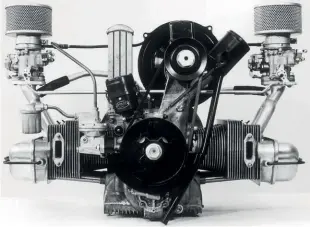  ??  ?? Top right In 1950, Ferry Porsche (second from left) with his father, Ferdinand Porsche (far right), in front of a 356 engine. To Ferry’s left is Hans Klauser, who had already worked on VW developmen­t before the war and who was the Porsche’s customer service manager until he retired in 1978. To Ferry’s right is engine mechanic, Hugo Heiner.