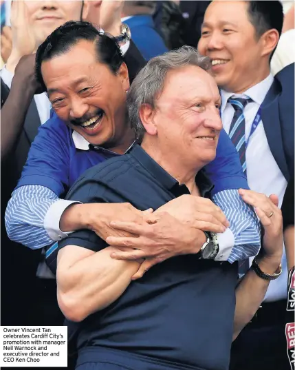  ??  ?? Owner Vincent Tan celebrates Cardiff City’s promotion with manager Neil Warnock and executive director and CEO Ken Choo