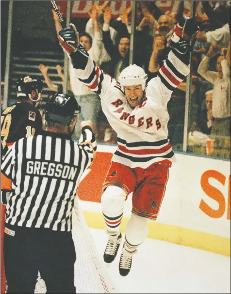  ?? — AP FILES ?? After his famous guarantee that the New York Rangers would rally to defeat the New Jersey Devils in the Eastern Conference final, captain Mark Messier led his team to a Stanley Cup victory over the Canucks in seven games.